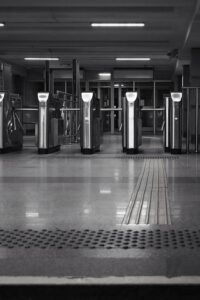 turnstiles, entrance, black and white